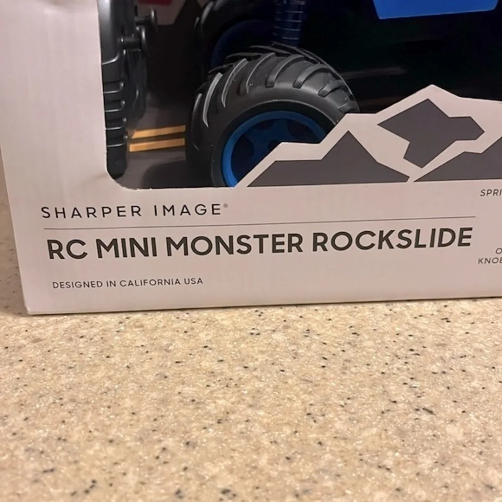 Brand New Sharper Image Remote Control Mini Monster Truck Rockslide Blue Toy